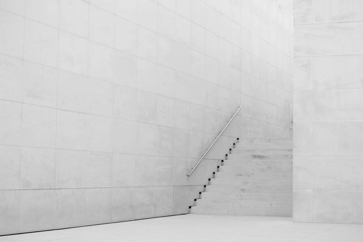 Precise architectural lines used as a visual reference for careful, measured wording