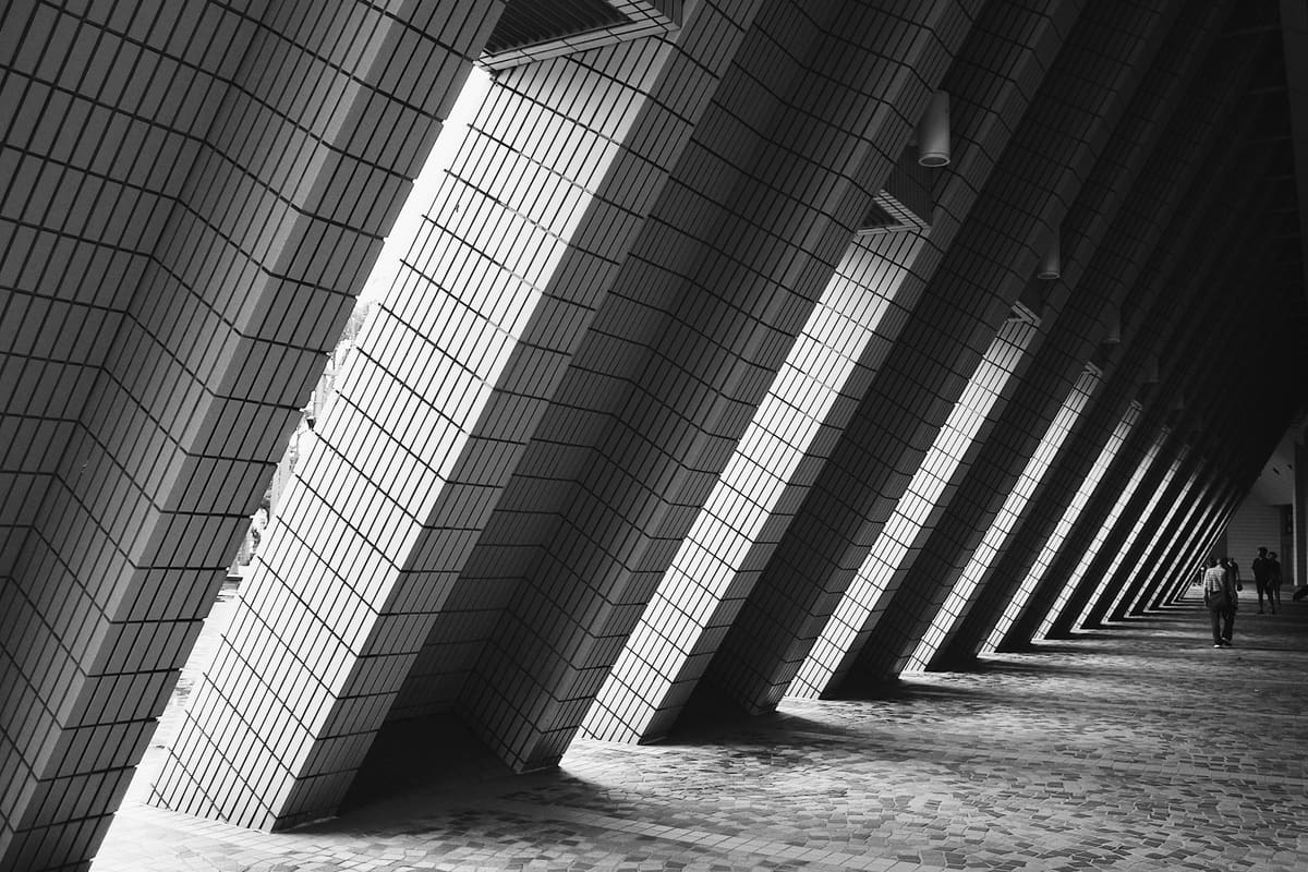 Layered facade geometry standing in for requirements recorded in writing